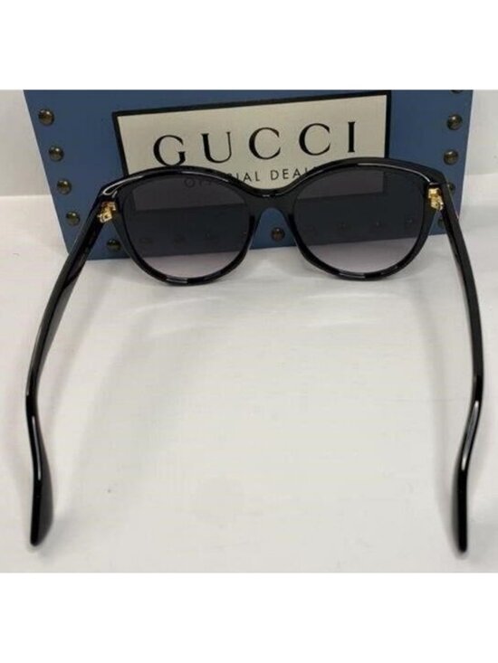 GUCCI GG0631S 001 round sunglass comes black frame with grey gradient lenses main image 5